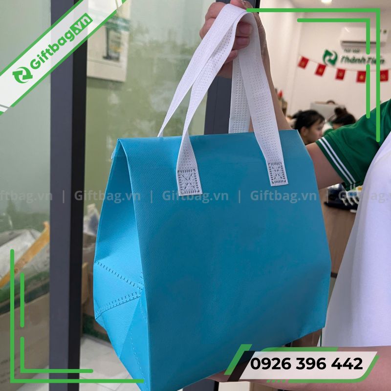 tui-giu-nhiet-mau-xanh-6